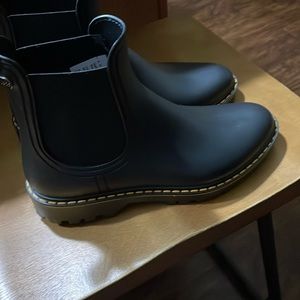 Black rain boots